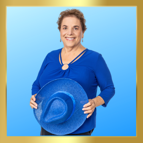 Nancy holding a blue hat