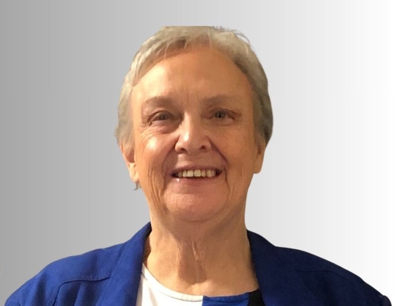 Darlene wearing a blue blazer